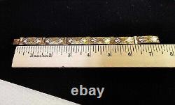 10k gold bracelet with cut flower blue dot white enamel with marked 7.5- 8.56g- B27