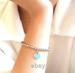 Authentic Tiffany & Co. Enamel Blue Mini Double Heart Bracelet