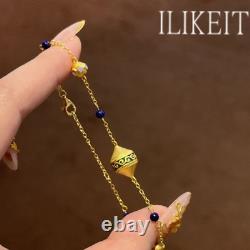 Gold Tone Evergreen Bracelet with Enamel Charms & Blue Beads Ethnic Style