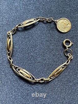 Interesting Gold plated Bracelet with blue enamel residue & an Indian medal