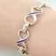Italy Blue Enamel 8 Figure Sterling Silver Link Bracelet