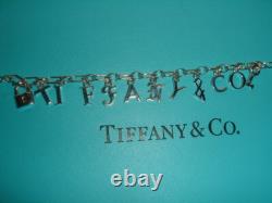 New Tiffany & Co Sterling Silver Blue Enamel Love Notes Logo Charm Bracelet 6.5
