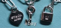 New Tiffany & Co Sterling Silver Blue Enamel Love Notes Logo Charm Bracelet 6.5