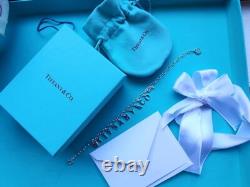 New Tiffany & Co Sterling Silver Blue Enamel Love Notes Logo Charm Bracelet 6.5