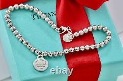 Return To Tiffany & Co. Silver Blue Enamel Heart Round Tag Beaded 7.25 Bracelet