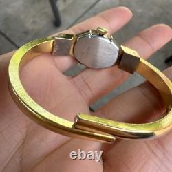 Swiss made blue green red enamel flower peekaboo watch bracelet gold tone