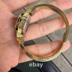 Swiss made blue green red enamel flower peekaboo watch bracelet gold tone