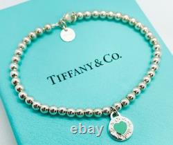 Tiffany & Co. 925 Silver Blue Enamel Sunburst Heart Round RTT Bead Bracelet 7