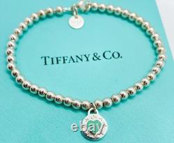 Tiffany & Co. 925 Silver Blue Enamel Sunburst Heart Round RTT Bead Bracelet 7