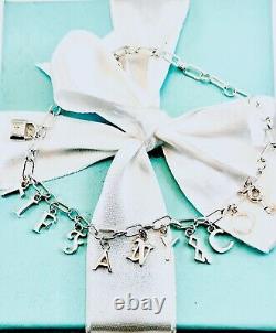 Tiffany & Co Love Notes Dangle Charm Bracelet. Sterling Silver Blue Enamel. New