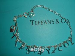 Tiffany & Co Sterling Silver Blue Enamel Love Notes Logo Charm Bracelet 6.5