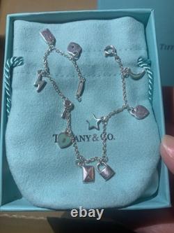 Tiffany & Co. Sterling Silver & Blue Enamel Love Notes Mini Charm Bracelet. 925