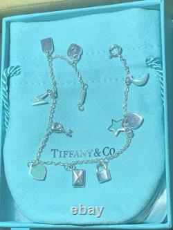 Tiffany & Co. Sterling Silver & Blue Enamel Love Notes Mini Charm Bracelet. 925