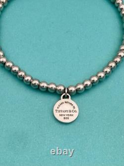 Tiffany & Co Sterling Silver & Blue Enamel Round Tag Mini Bead Bracelet 7.5