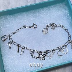 Tiffany & Co Sterling Silver Blue Enamel TIFFANY&CO Charm Bracelet 7.5 Box &bag