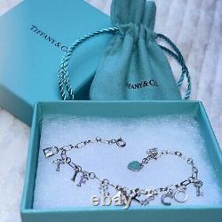 Tiffany & Co Sterling Silver Blue Enamel TIFFANY&CO Charm Bracelet 7.5 Box &bag