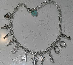 Tiffany & Co Sterling Silver Charm Blue Enamel Bracelet 7.75