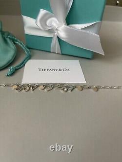 Tiffany Retired Silver Love Notes Charm Bracelet 6.75 New in Box with straw