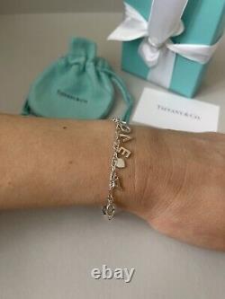 Tiffany Retired Silver Love Notes Charm Bracelet 6.75 New in Box with straw