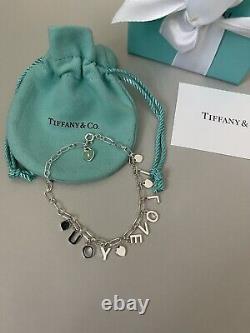 Tiffany Retired Silver Love Notes Charm Bracelet 6.75 New in Box with straw