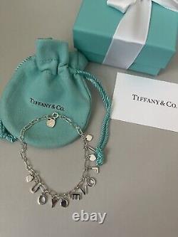 Tiffany Retired Silver Love Notes Charm Bracelet 6.75 New in Box with straw