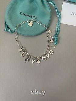 Tiffany Retired Silver Love Notes Charm Bracelet 6.75 New in Box with straw