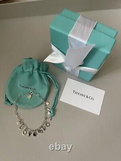 Tiffany Retired Silver Love Notes Charm Bracelet 6.75 New in Box with straw