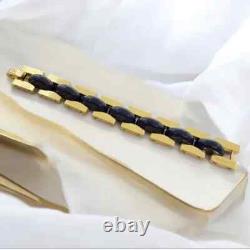 Tory Burch Chunky Statement Gold Tone Bracelet in Blue Enamel Inlay