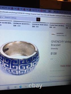 VTG GIVENCHY Gold tone Blue enamel clamper Bracelet Hinged Classic logo design