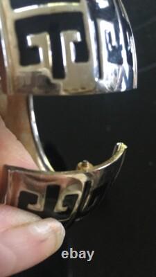 VTG GIVENCHY Gold tone Blue enamel clamper Bracelet Hinged Classic logo design