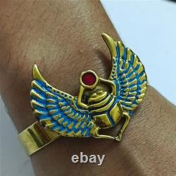 Vintage brass Egyptian scarab bracelet with blue wings & red enamel gem Unique