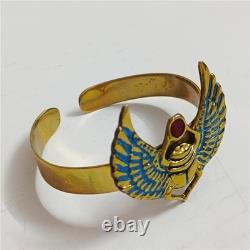 Vintage brass Egyptian scarab bracelet with blue wings & red enamel gem Unique